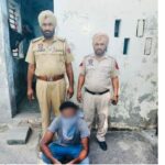 Absconder Arrested