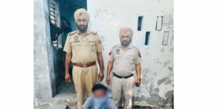 Absconder Arrested