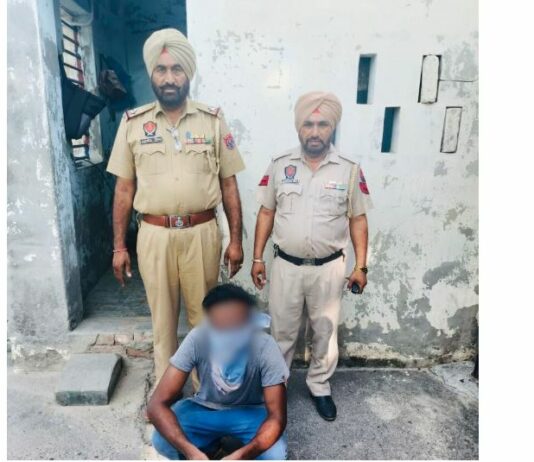 Absconder Arrested