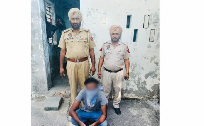 Absconder Arrested